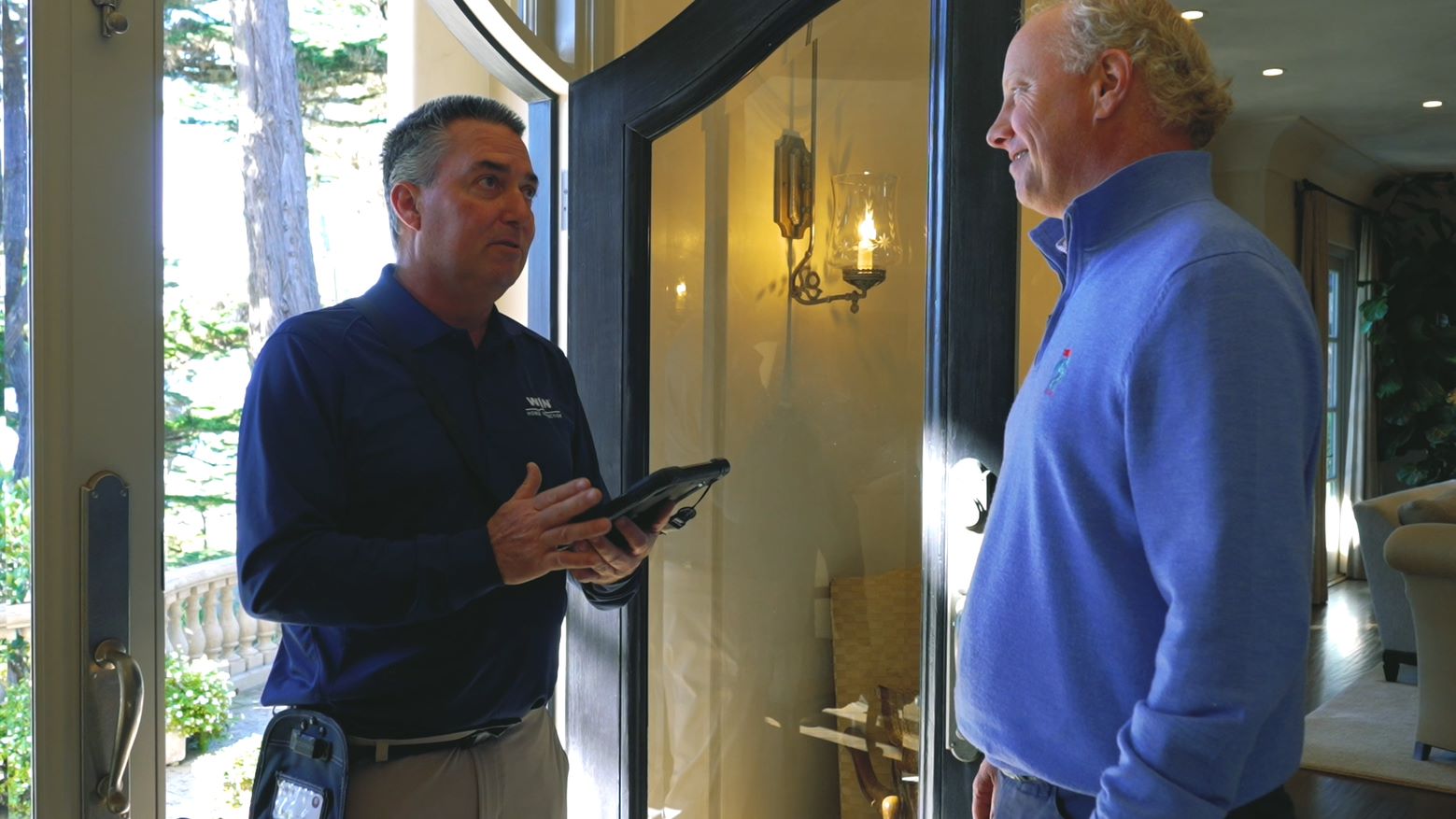 WIN Home Inspector with a happy client
